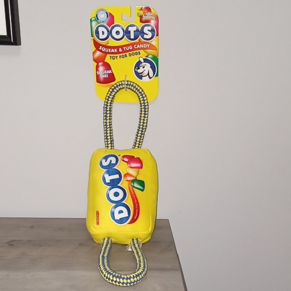 DOTS bright yellow Squeak & Tug Toy